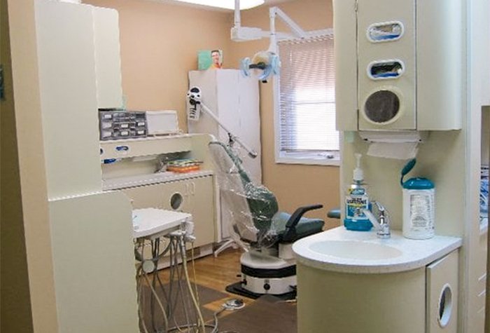 Dental treatment room viewed from hallway