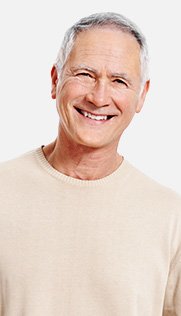 Smiling older man in white T shirt